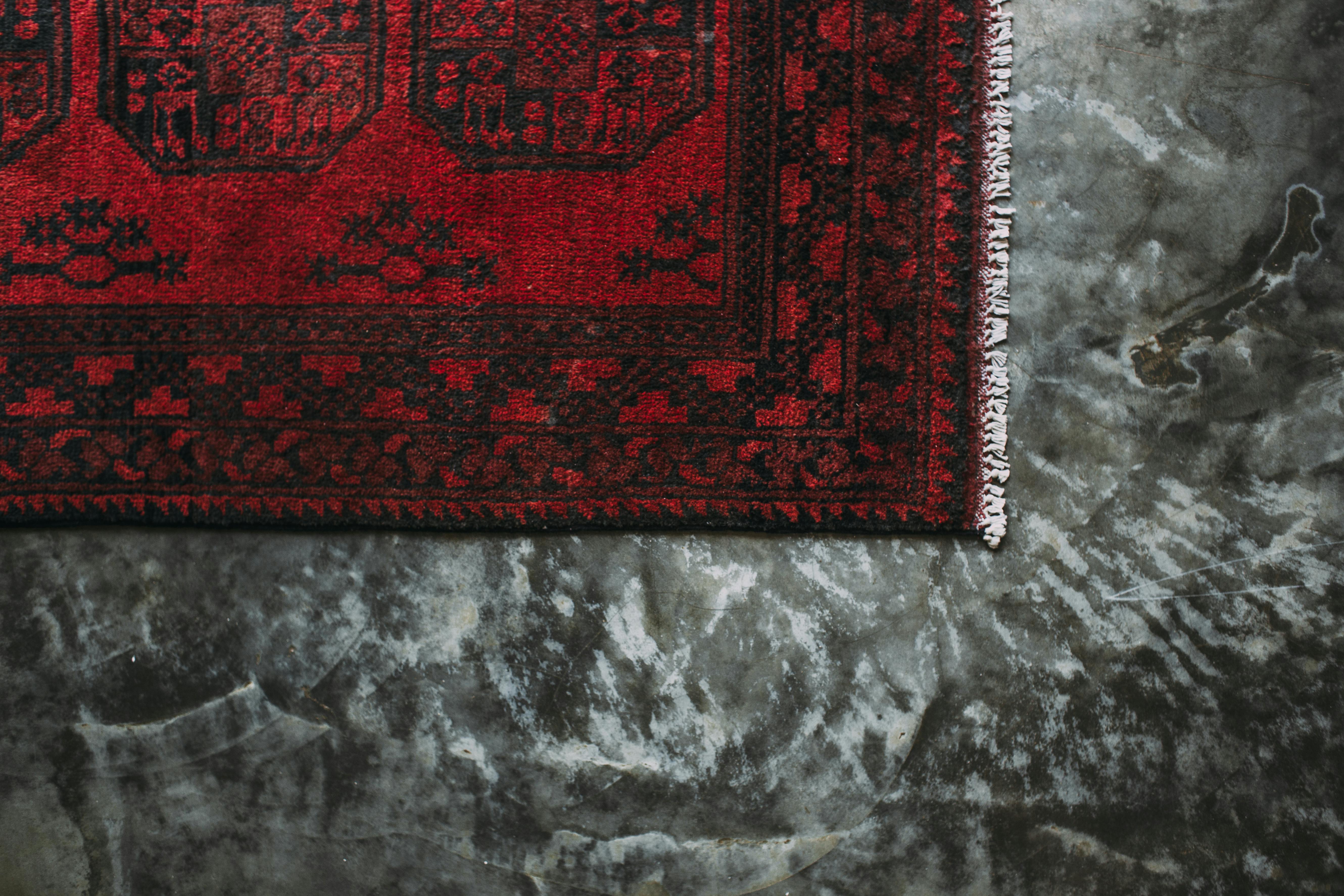 A beautiful dark red wool rug