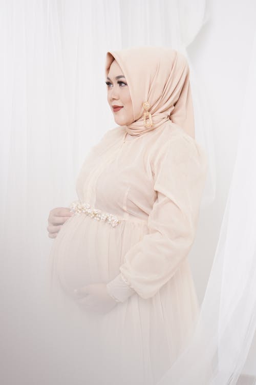 Pregnant Woman Wearing Beige Hijab