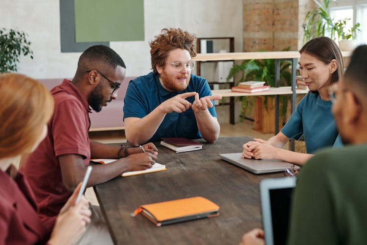 A Group Of People Having A Business Meeting