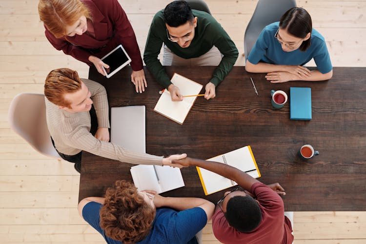 Men In Agreement During A Meeting