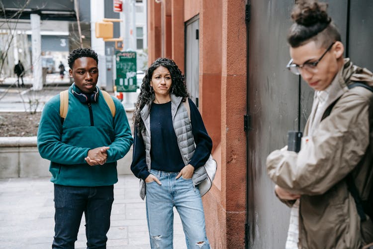 Diverse Teens Bullying Young Male Groupmate