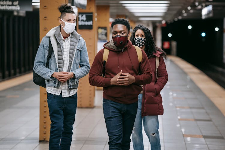 Young Multiethnic Students In Medical Masks