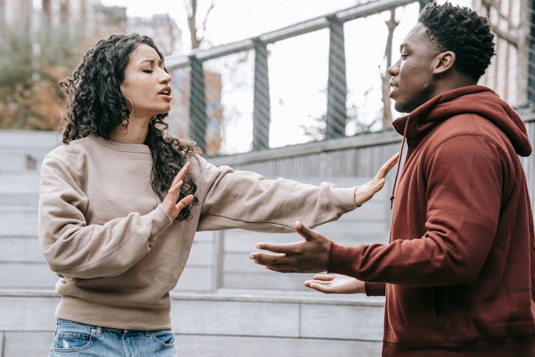 Multiracial Couple Having Conflict On Street