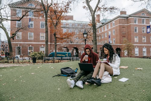 Man and Woman Studying at a Park