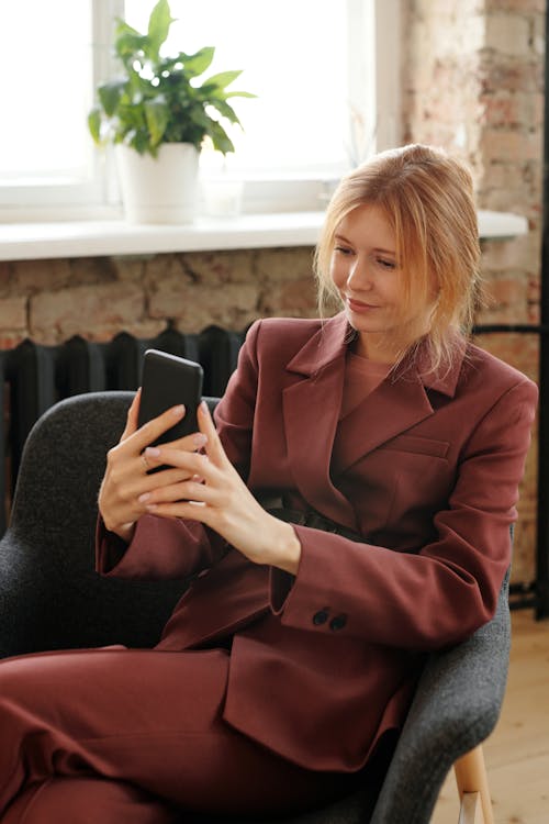 Woman Wearing Blazer Taking Selfie