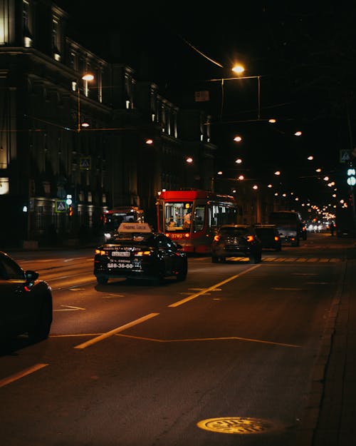 Traffic on modern city street at night