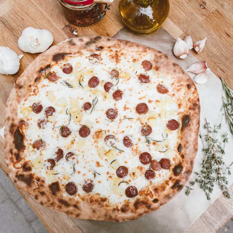 Homemade White Pizza with Ricotta, Mozzarella and Garlic Oil
