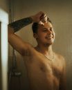 Topless Man Holding His Head