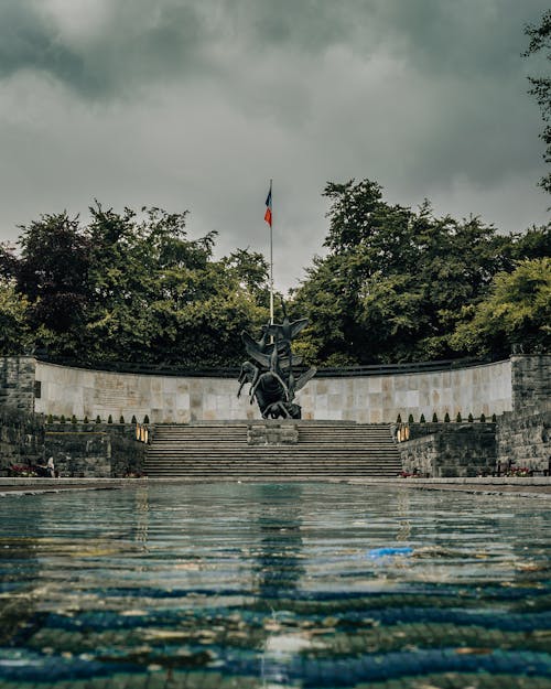 Concrete Statue Beside the Lake