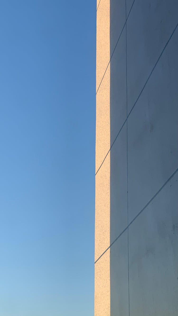 Side Of Building Wall Illuminated By Sunlight