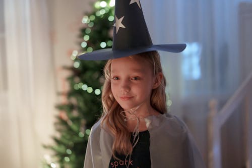 Blonde Girl with Black Hat at Christmas