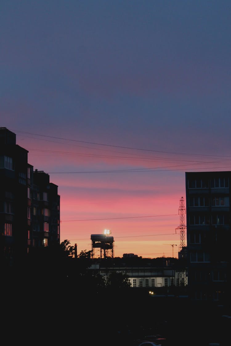 Silhouette Of Buildings During Sunset