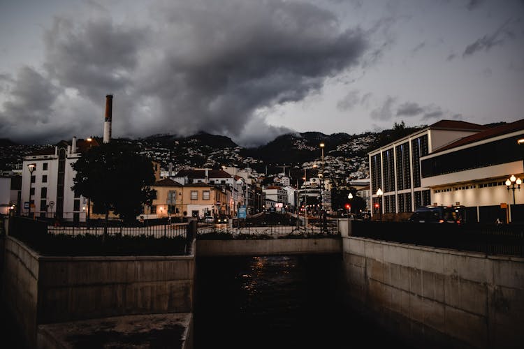 City Buildings Under Cloudy Sky