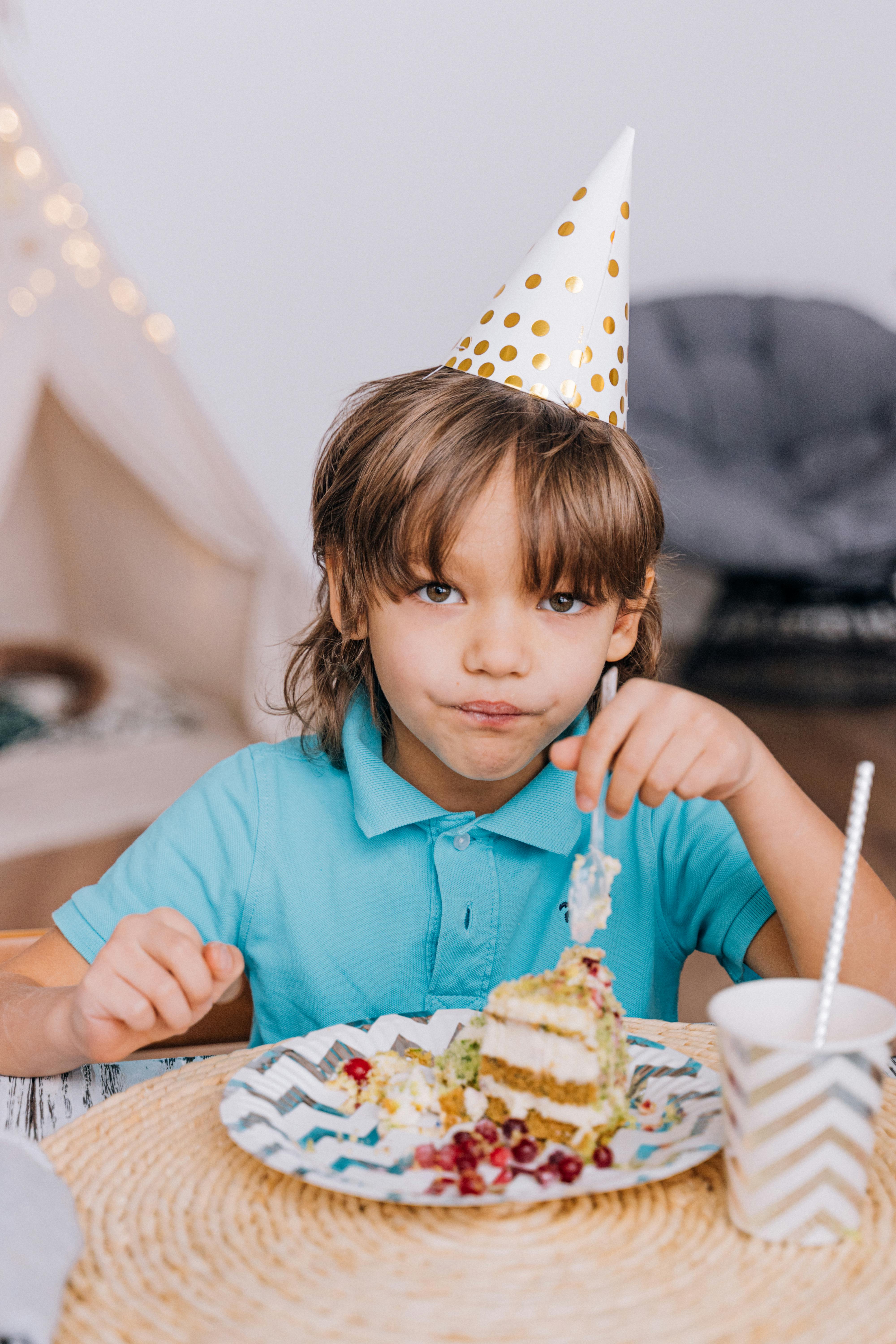 Portrait Of Cute Boy Eating Cake Slice In House Stock Photo, Picture and  Royalty Free Image. Image 25294808.