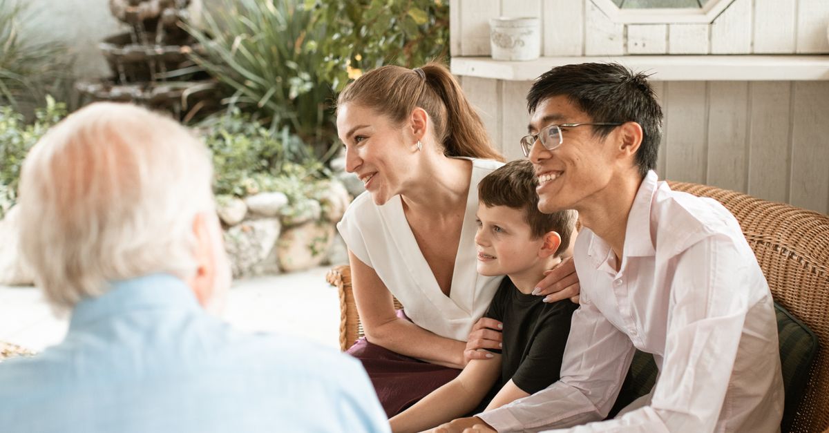 Family Sitting Together · Free Stock Photo