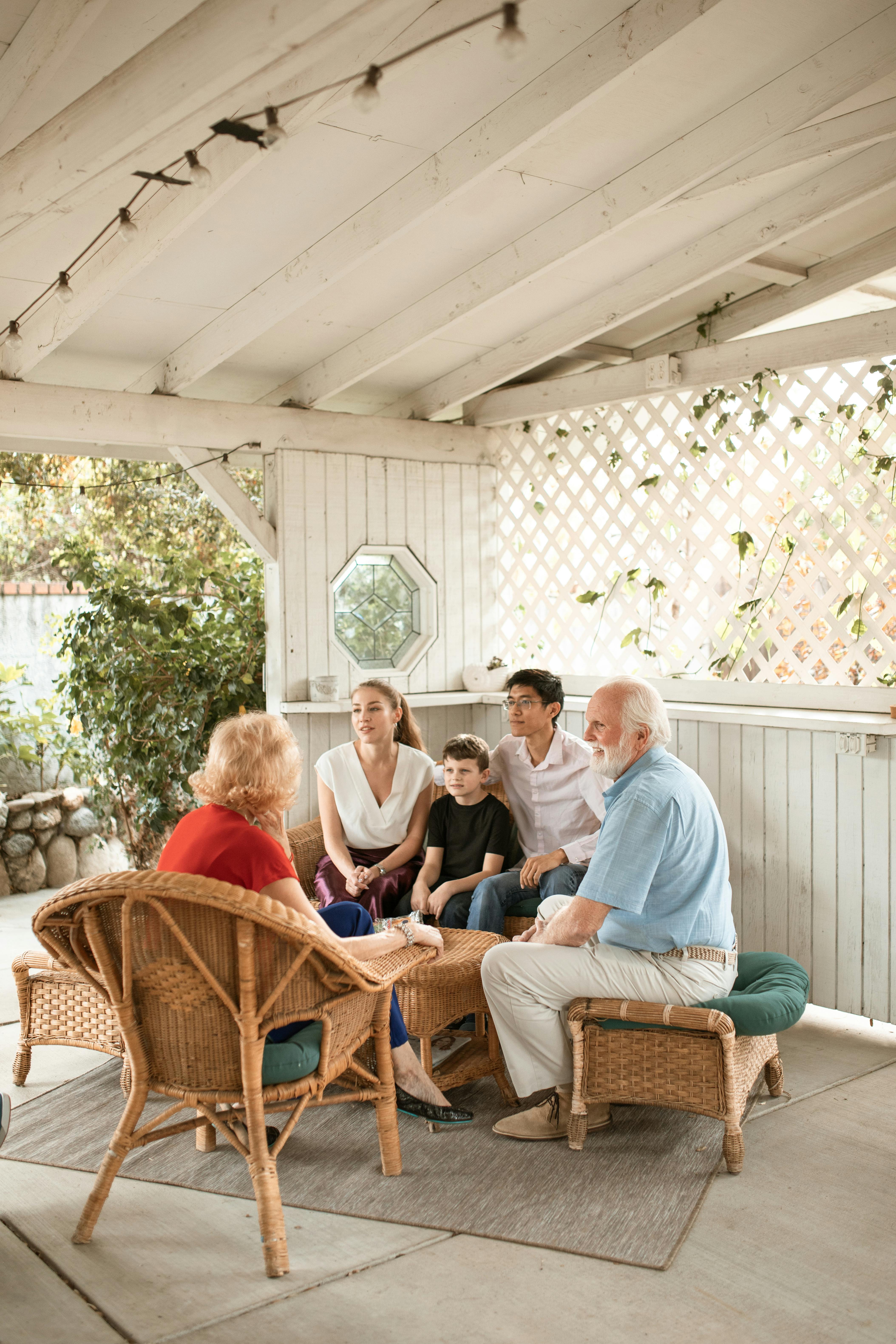 young family talking to their parents