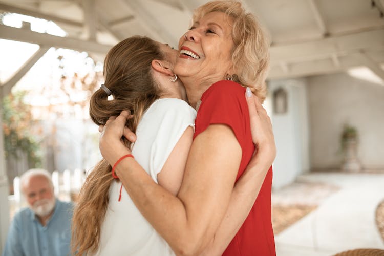 Elderly Woman And A Woman Happy Hugging Each Other