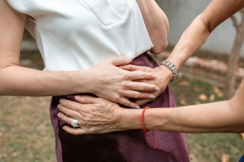 Hands Touching Tummy 