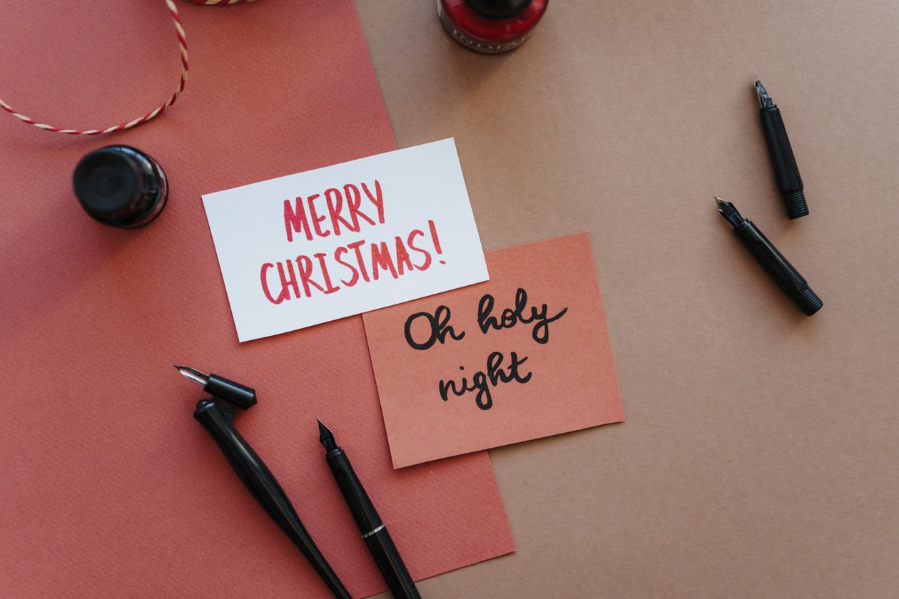 A signature in progress on a formal document with a fountain pen — professional signature moment