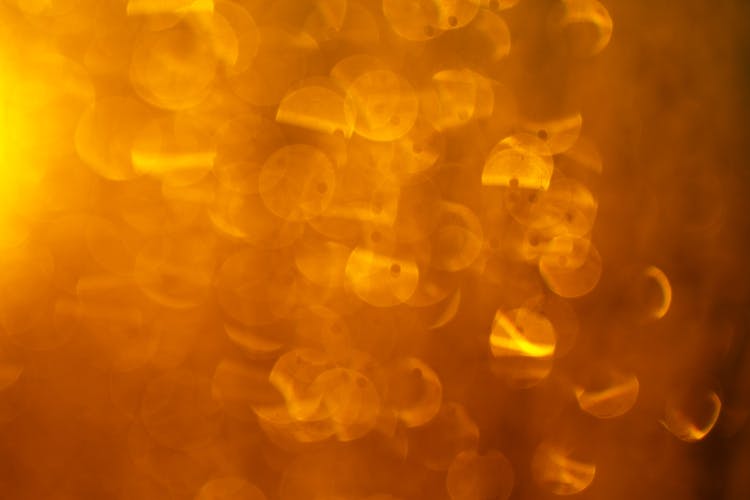 Bokeh Lights On Orange Background 