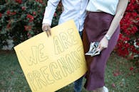 Person Holding Yellow and White Happy Birthday Greeting Card