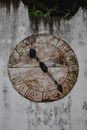 Brown and Black Round Analog Wall Clock