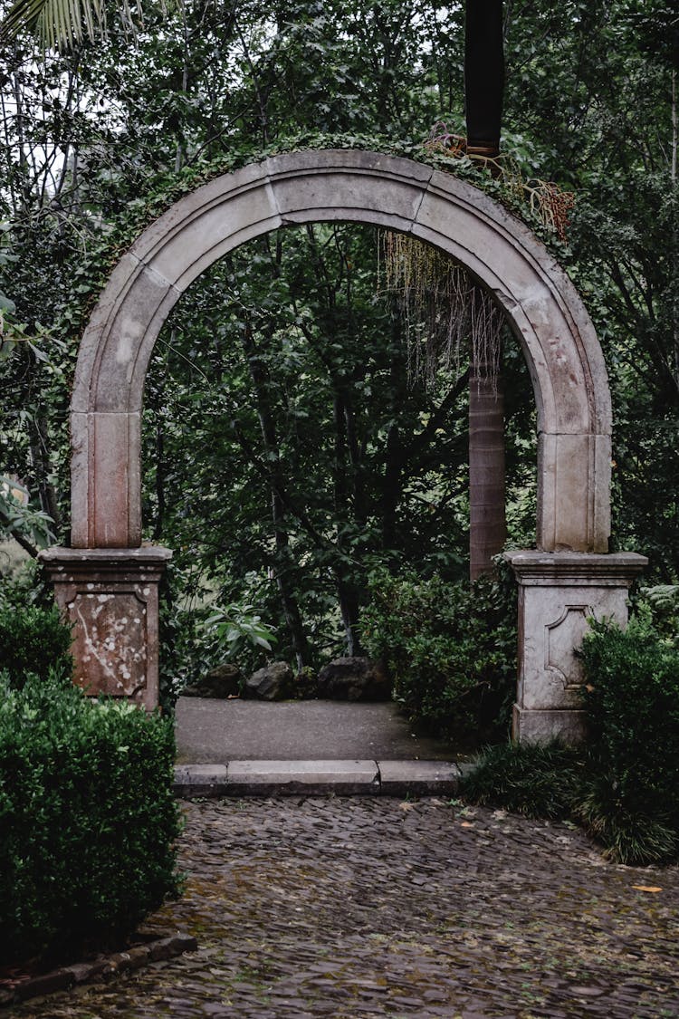 Concrete Arch Gateway On A Garden