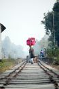 A Person Crossing a Railway