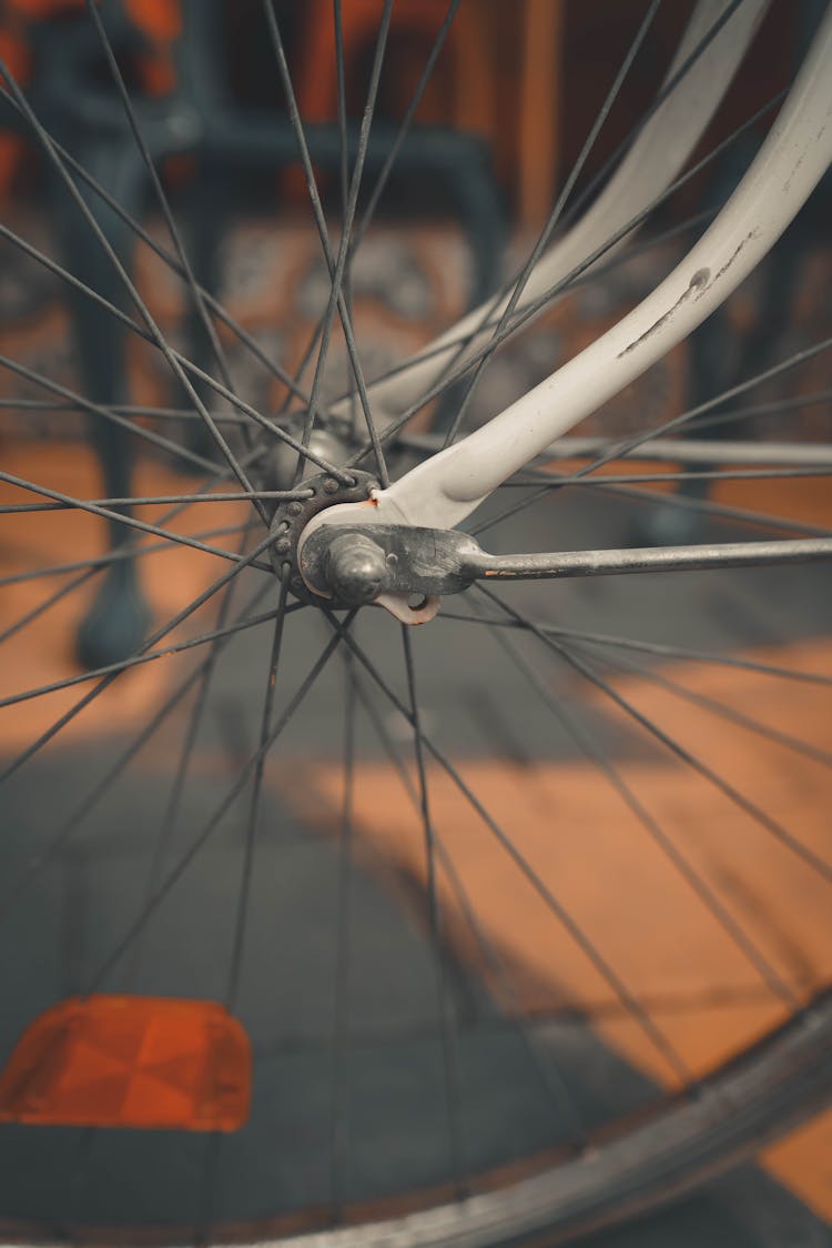 
A Close-Up Shot Of Bicycle Wheel Spokes