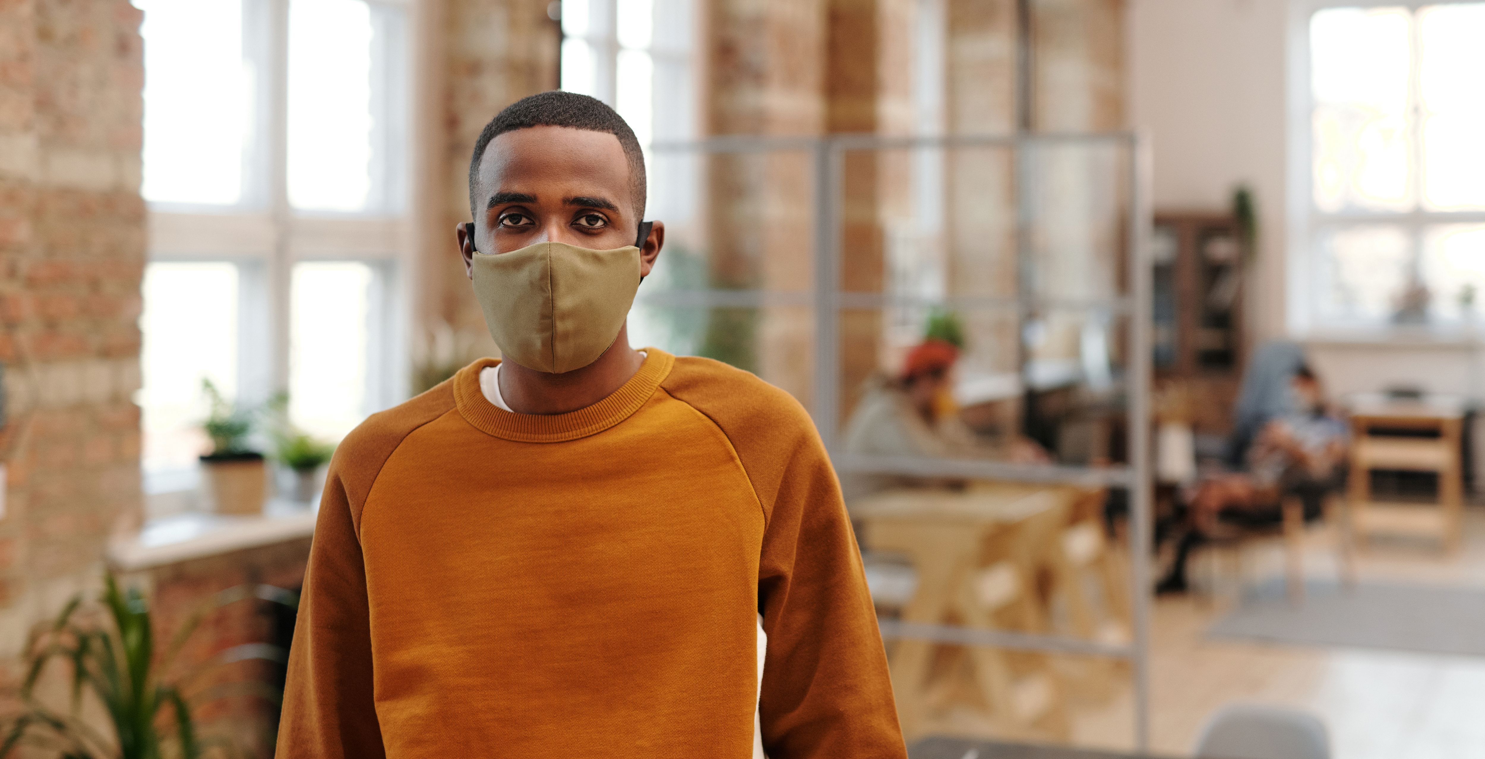 A Man Wearing a Face Mask · Free Stock Photo