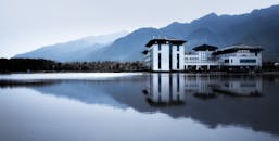 Landscape with Mountains, Lake and Hotel