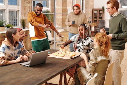 Free Multiracial Group of People in a Room Stock Photo