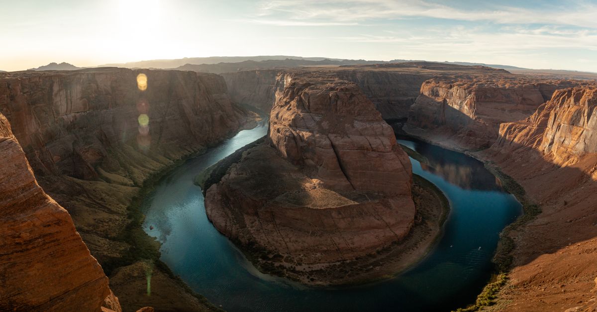 Stunning aerial view of Horseshoe Bend with the Colorado River in Arizona's scenic desert landscape.