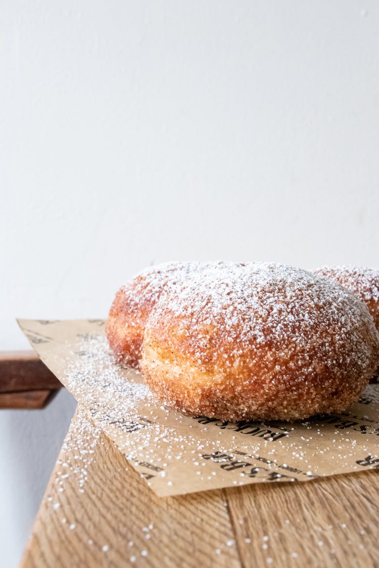 Powdered Donuts On Baking Paper