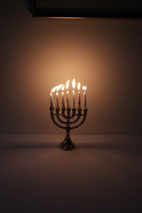 Lighted Candles On A Table