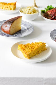 Delicious collection of traditional Jewish dishes set for a festive celebration, featuring diverse homemade cuisine.