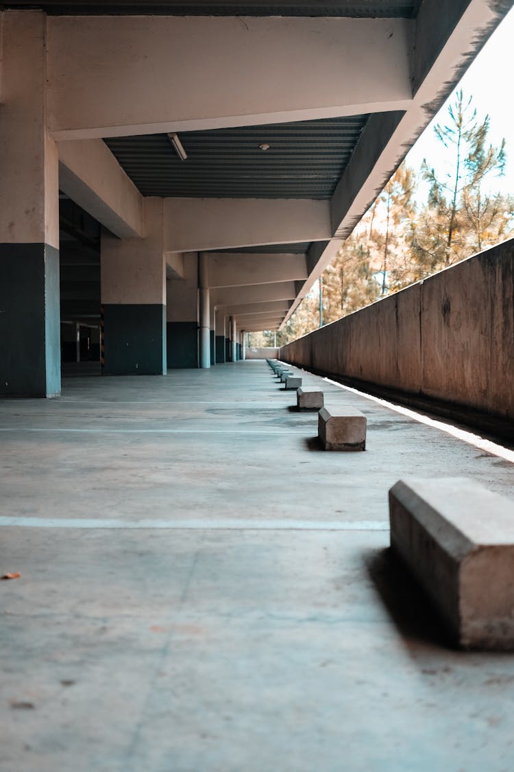 An Emtpy Parking Lot Of A Building