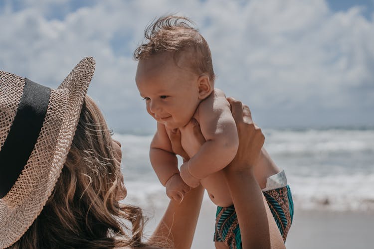 Happy Baby And Mom In Summer