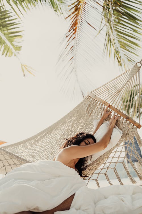 Free A Woman Lying on Hammock Stock Photo