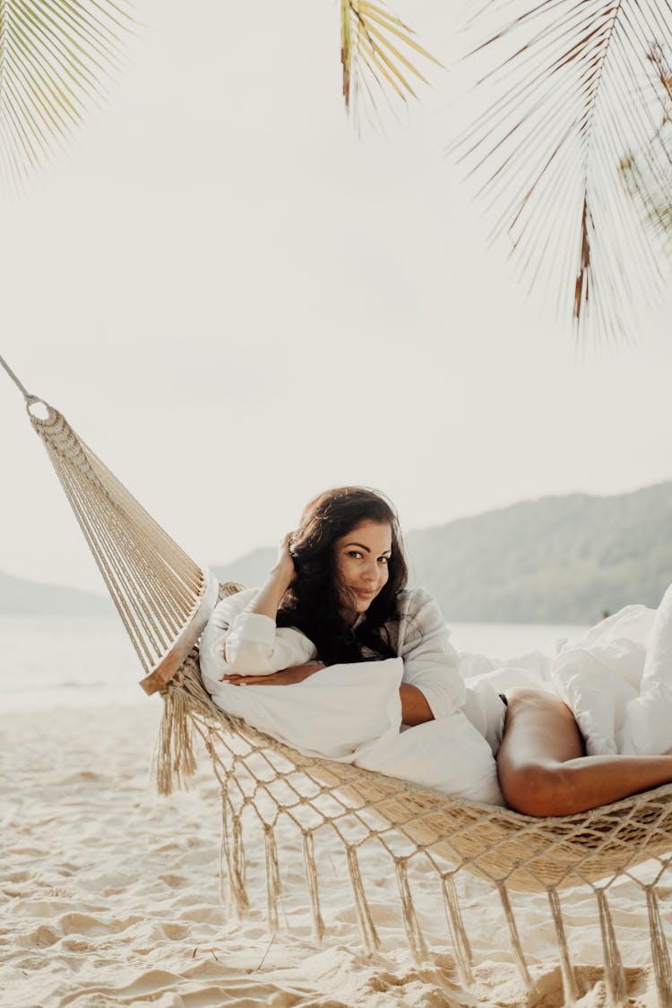 Woman On A Hammock In A Beach