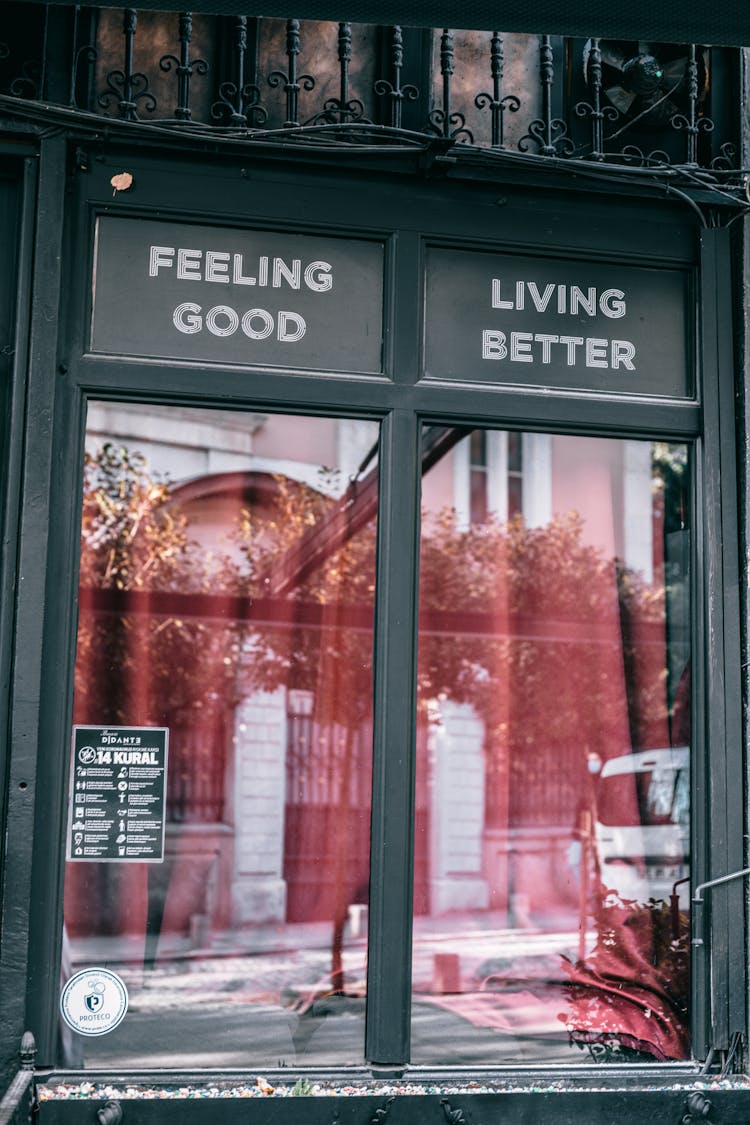 Windows Of Modern Restaurant With Signboards Saying Feeling Good