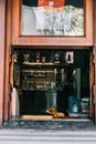 From outside small takeaway window above contemporary cafeteria counter equipped with modern appliances in daylight