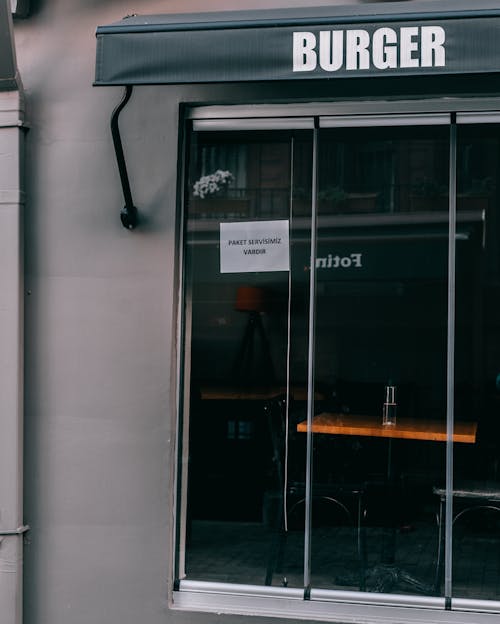 Exterior of modern fast food restaurant with big window