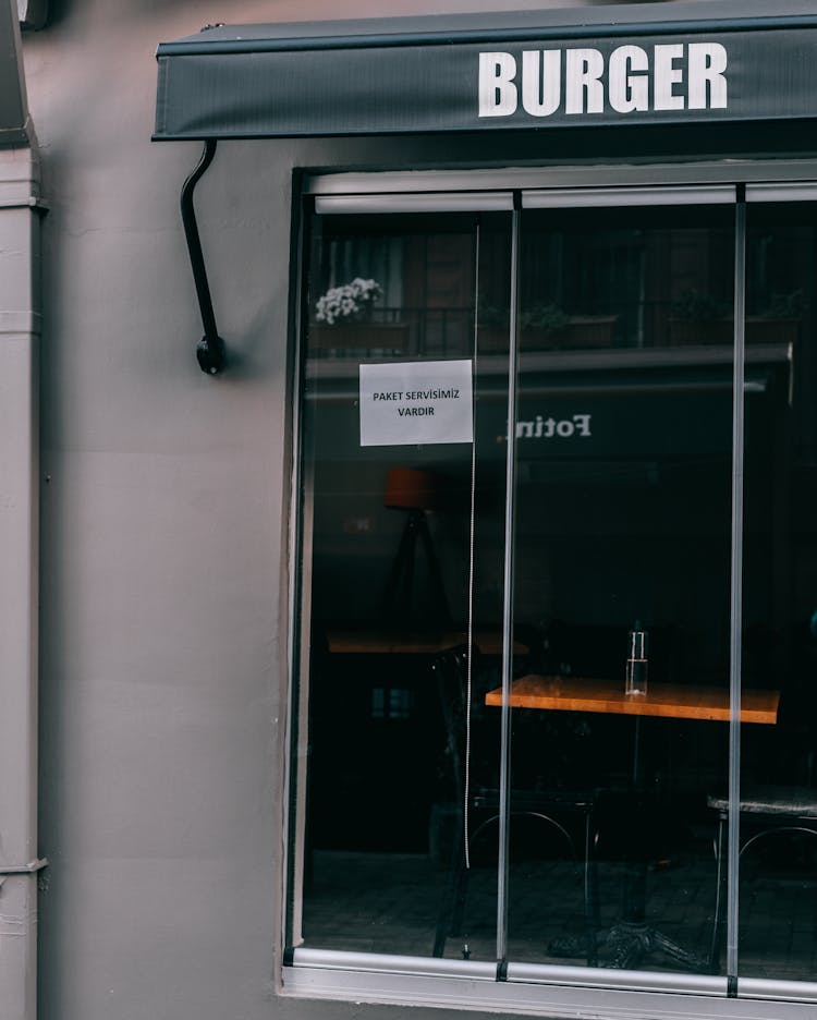 Exterior Of Modern Fast Food Restaurant With Big Window