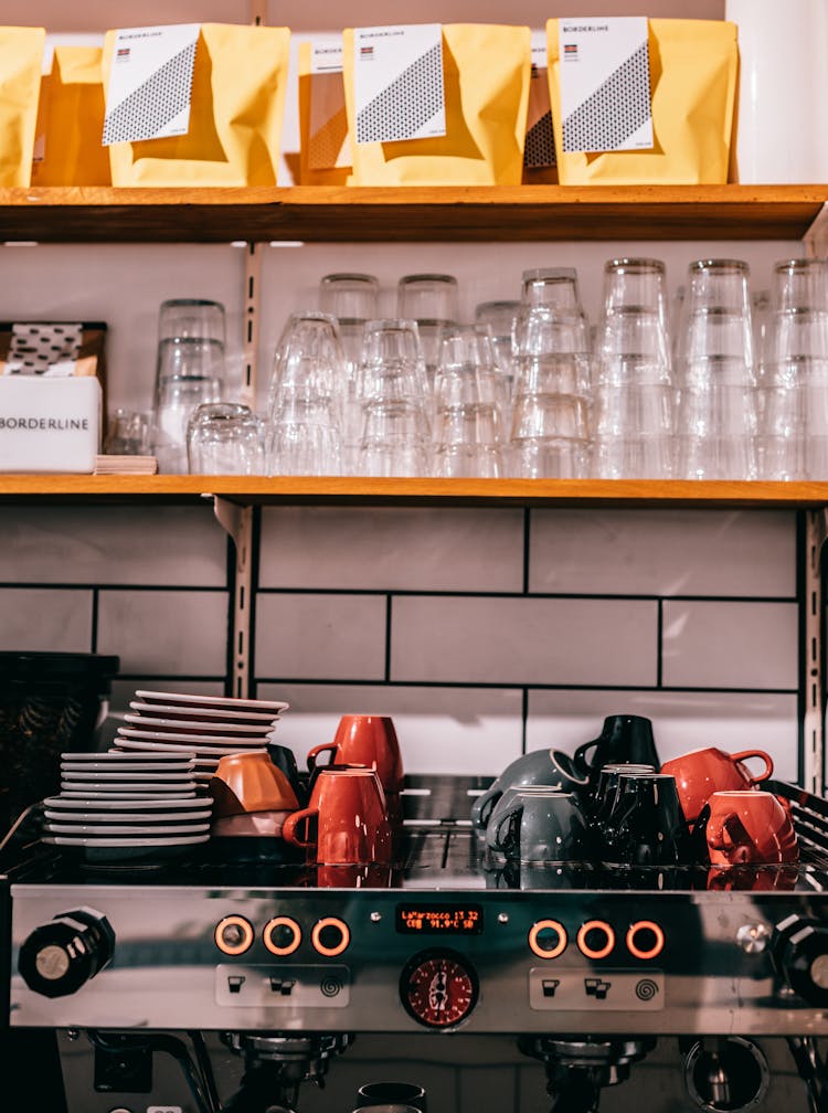 Cafe Kitchen With Coffee Machine And Glassware