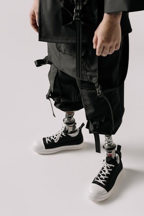 Person Standing with Prosthetic Legs