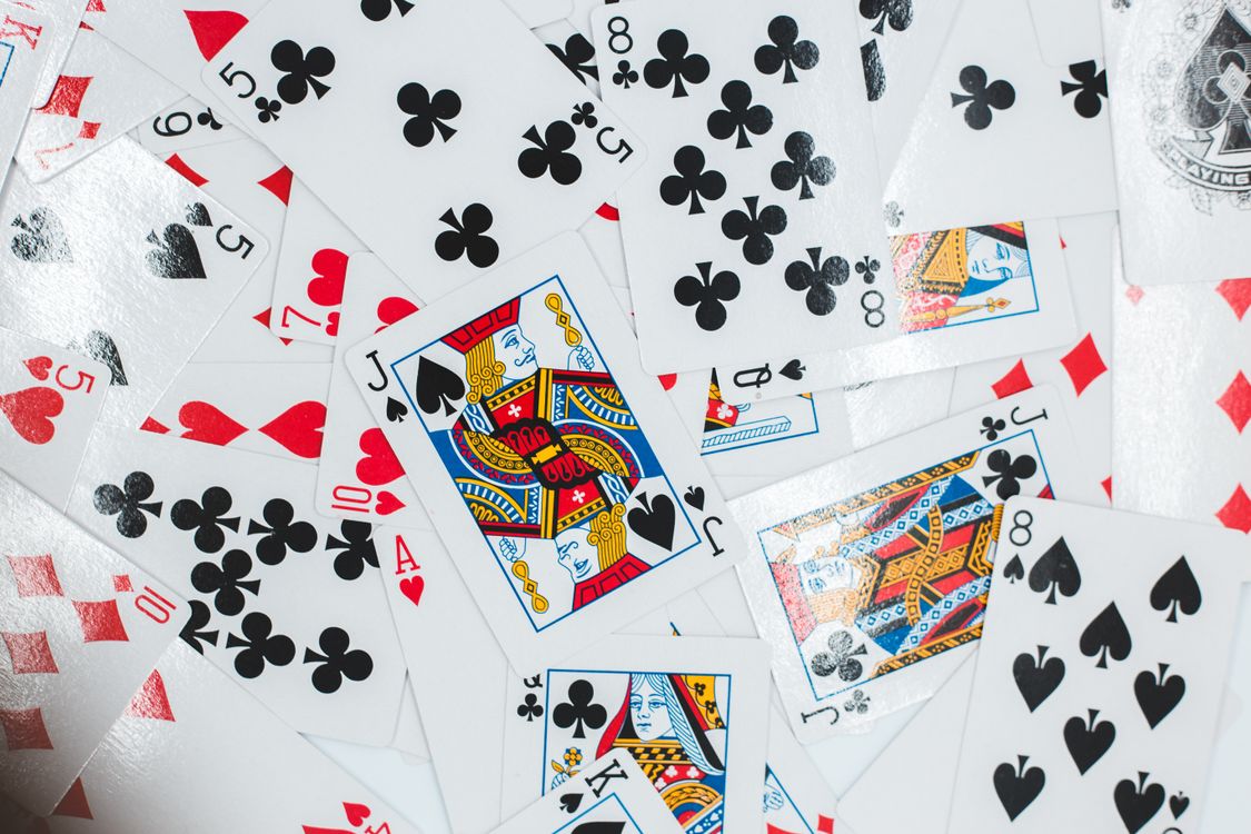 Cards Pile Pattern Scattered pile of playing cards · Free Stock Photo