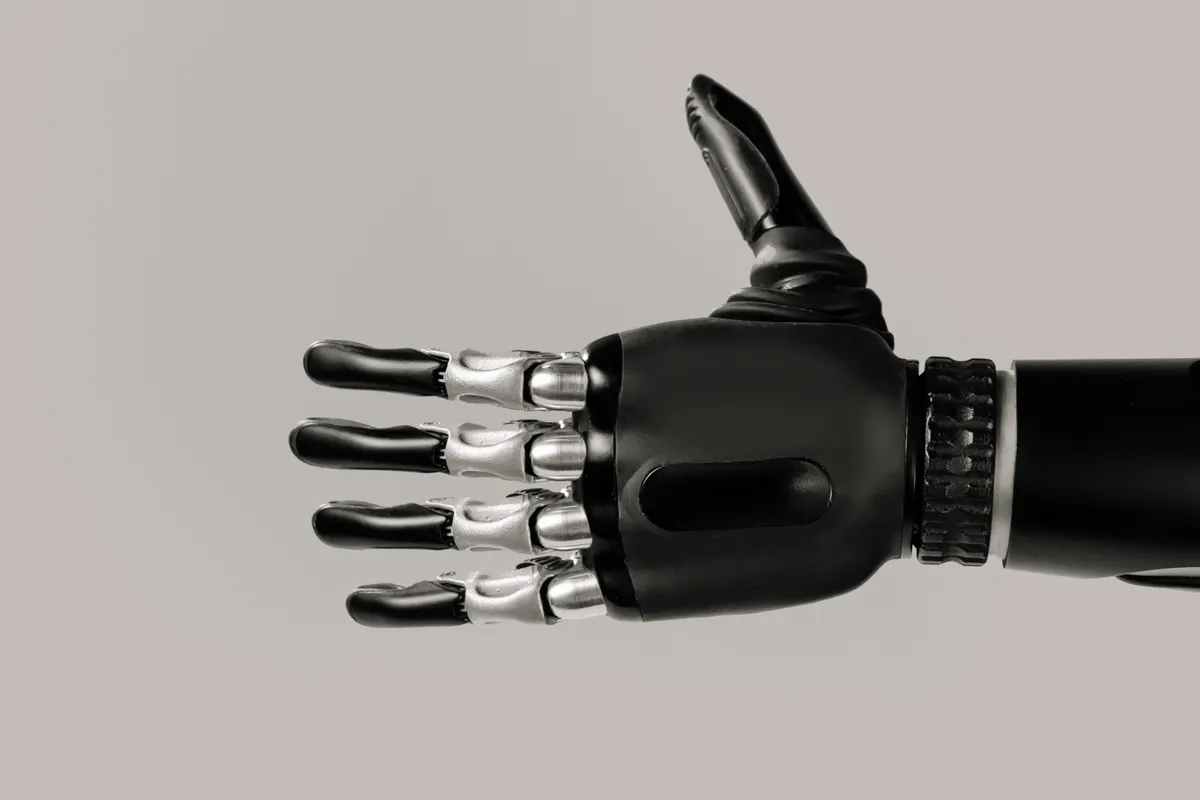 A robotic hand representing ai copywriting software and automation.