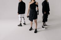 Men and Woman Wearing Prosthetic Legs and Arm