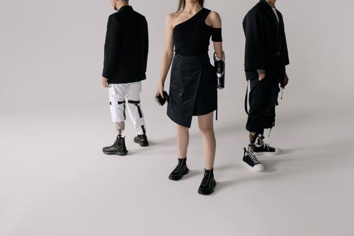 Free Stylish individuals with prosthetics showing modern fashion and strength. Stock Photo
